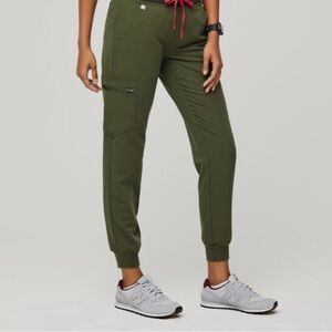 Figs olive colored jogger scrub pants with elastic waistband.